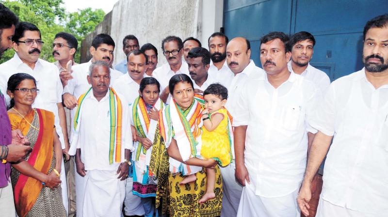 Akhila Anjuna and Advika being received by their family and Congress leaders outside Kannur prison on Saturday after the sisters were granted bail