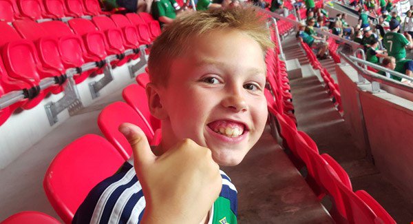 Zak watching Northern Ireland play Ukraine in France after he received a Euro 2016 ticket for his birthday. PRESS ASSOCIATION