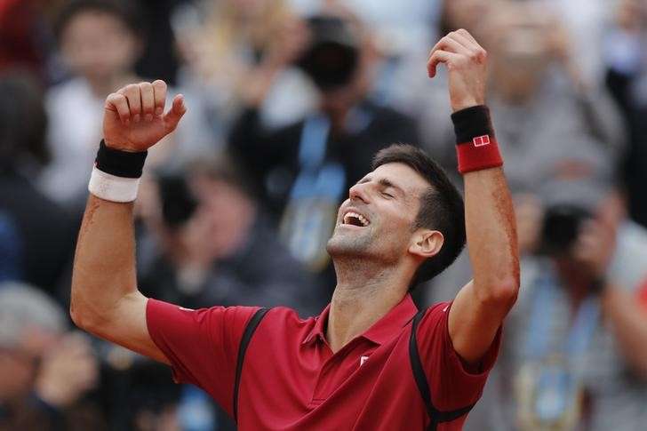 Novak Djokovic celebrates