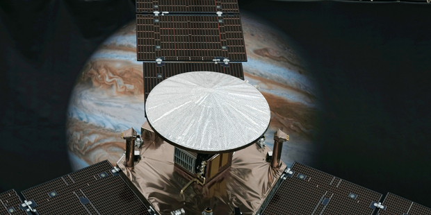 A 1/4 scale model size of NASA's solar-powered Juno spacecraft is displayed at the Jet Propulsion Laboratory in Pasadena Calif