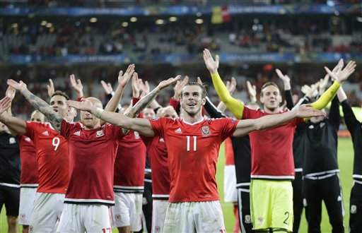 Wales warms to pressure of history-making Belgium game