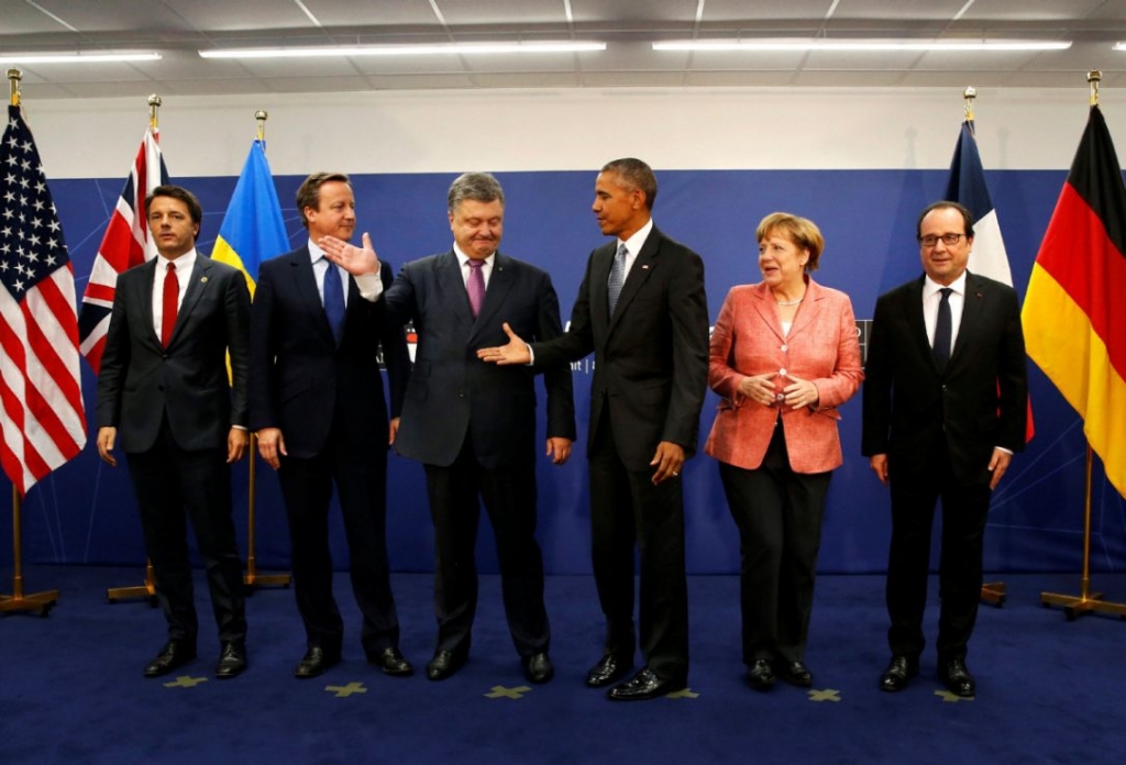 Left to right Italy's Prime Minister Matteo Renzi Britain's Prime Minister David Cameron Ukraine's President Petro Poroshenko U.S. President Barack Obama Germany's Chancellor Angela Merkel and France's President Francois Holl