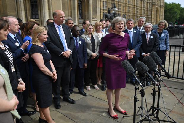 British Conservative party leadership candidate Theresa May speaks to members of the media at The St Stephen’s entrance to the Palace of Westminster in London