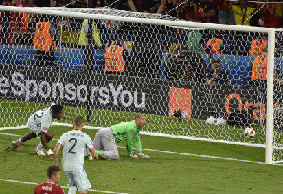 Belgium's forward Michy Batshuayi scores past Hungary's goalkeeper Gabor Kiraly during the Euro 2016 round of 16 football match between Hungary and Belgium at the Stadium Municipal in Toulouse