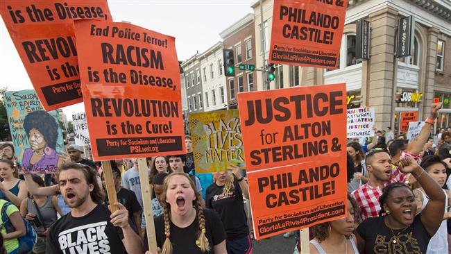 Black Lives Matter protestors shout slogans during a Black Lives Matter protest march thru the streets in Washington DC