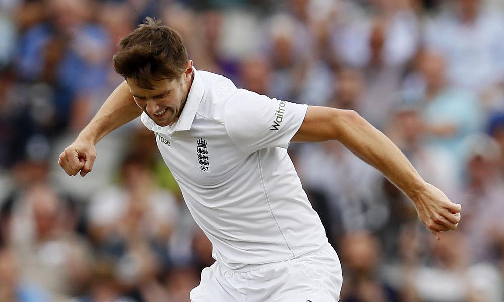 Chris Woakes celebrating the wicket of Yasir Shah on day three of the Old Trafford Test