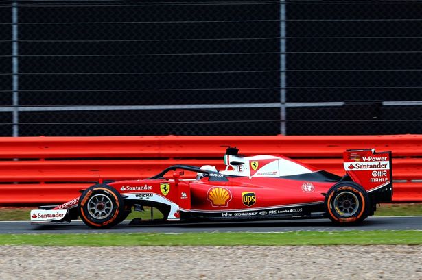 Clive Mason

Sebastian Vettel's Ferrari complete with Halo 2