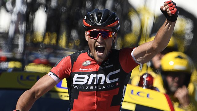 Greg van Avermaet celebrates as he crosses the finish line