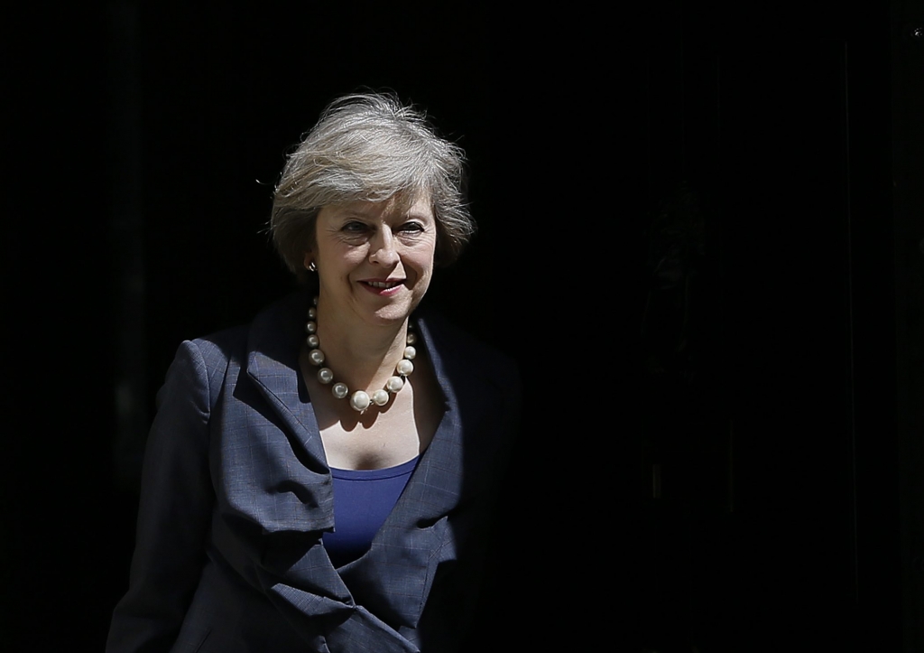 Britain's Home Secretary Theresa May leaves after attending a cabinet meeting at 10 Downing Street in London Tuesday