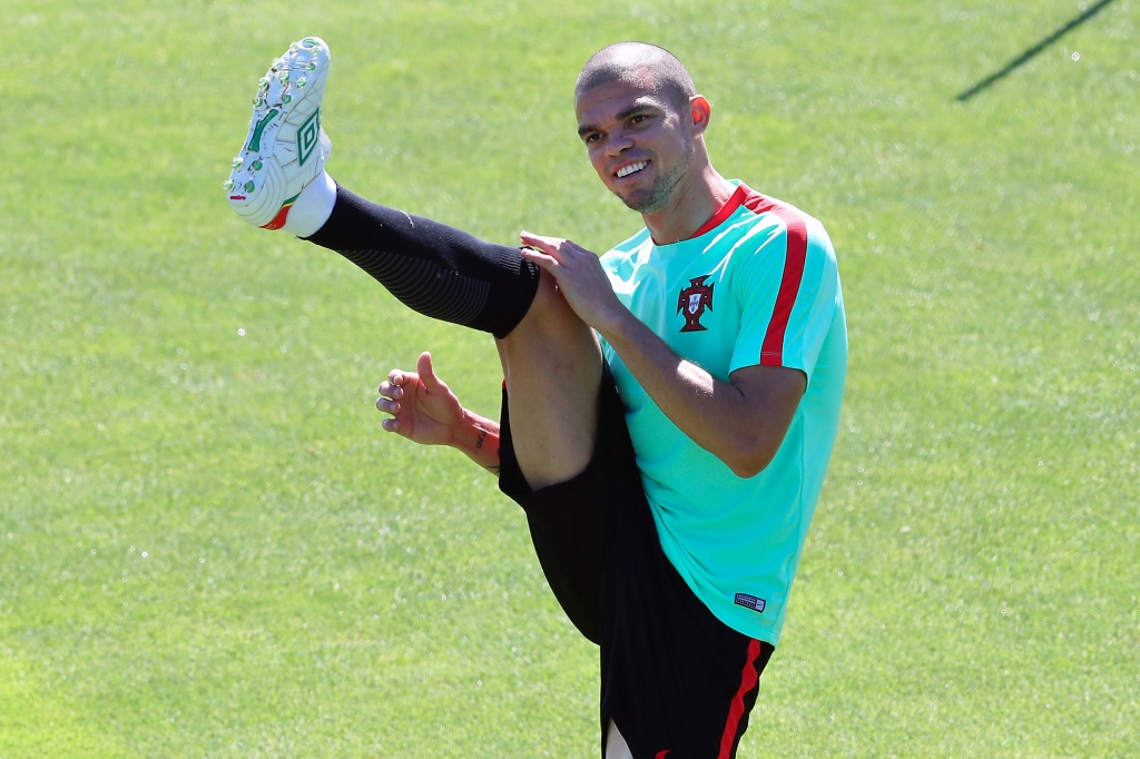 Portugal's Pepe stretches during a training session in Marcoussis near Paris France Saturday