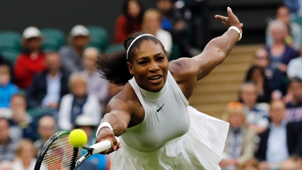 Serena Williams of the U.S returns to Christina Mc Hale of the U.S during their women's singles match on day five of the Wimbledon Tennis Championships in London. |AP