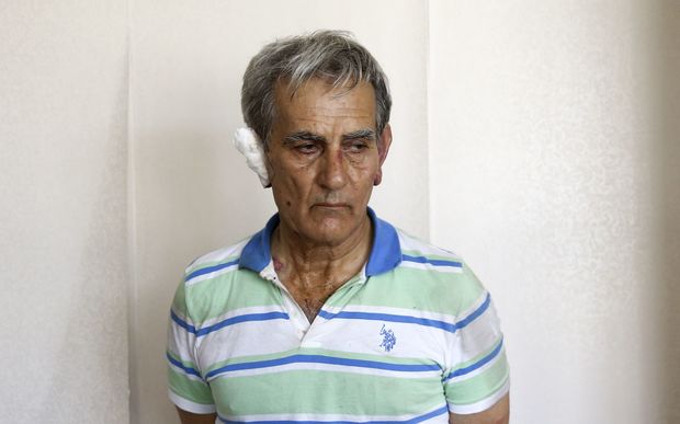 Former air force commander Gen. Akin Ozturk is seen under custody at Ankara Police Headquarters