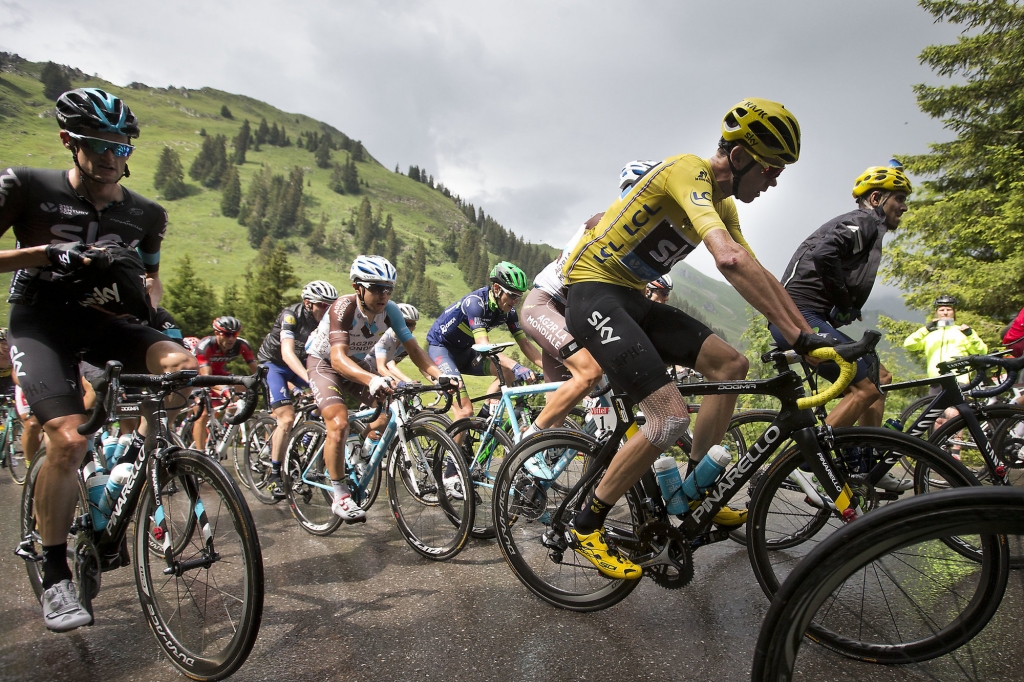 Britain's Chris Froome wearing the overall leader's yellow jersey climbs during the twentieth stage of the Tour de France cycling race over 146.5 kilometers with start in Megeve and finish in Morzine-Avoriaz France Saturday Jul