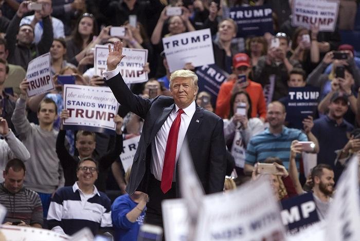 Republican presidential nominee Donald Trump seen here at his April campaign rally in Buffalo trails Hillary Clinton by a dozen points in the latest Quinnipiac University poll. Supporters though believe if he can chip into traditionally strong Democra