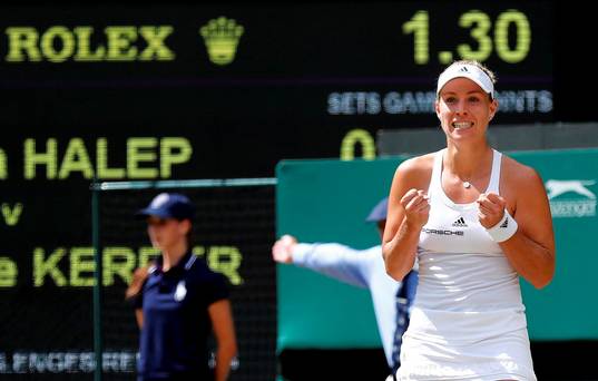 Germany's Angelique Kerber celebrates winning her match against Romania's Simona Halep. REUTERS  Stefan Wermuth