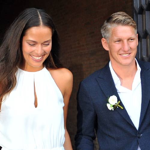 Ana Ivanovic and Germany soccer player Bastian Schweinsteiger smile during their wedding in Venice Italy Tuesday