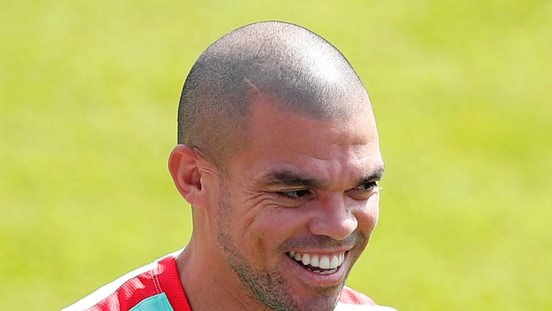 Portugal's Pepe arrives for a training session in preparation of the Euro 2016 final soccer match between France and Portugal at Marcoussis south of Paris France Friday