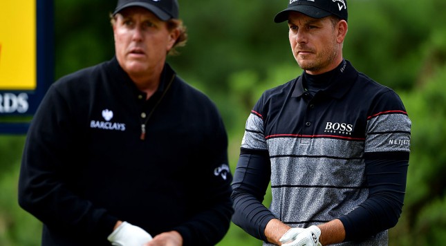 TROON SCOTLAND- JULY 17 Henrik Stenson of Sweden and Phil Mickelson of the United States look thoughtful as they wait on the 12th tee during the final round on day four of the 145th Open Championship at Royal Troon