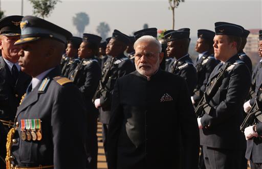 Indian Prime Minister Narendra Modi inspects the guard of honor at an arrivals ceremony at the Union Buildings in Pretoria South Africa Friday