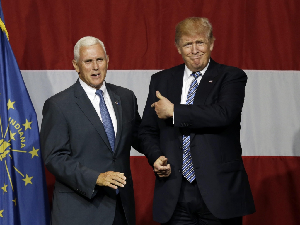 Indiana Gov. Mike Pence joins Republican presidential candidate Donald Trump at a rally in Westfield Ind. on Tuesday