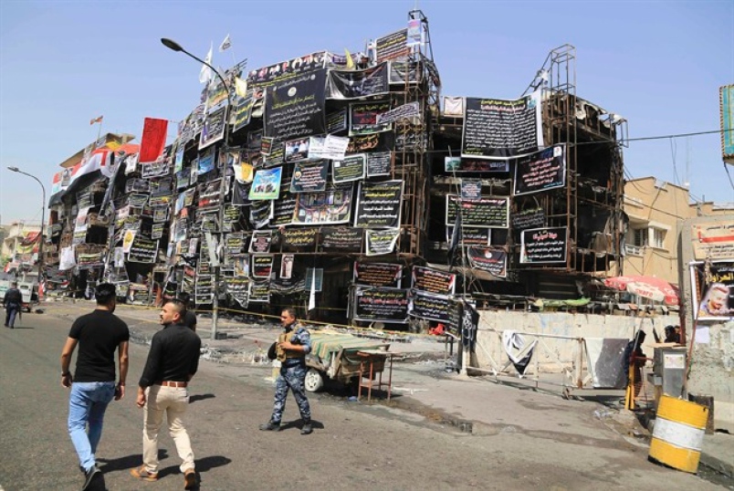 Iraqi officials: attack on Shiite shrine kills 37, wounds 62