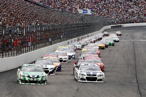 Kyle Busch and Jimmie Johnson lead the field at the start of the 2014 Camping World RV Sales 301 at New Hampshire Motor Speedway