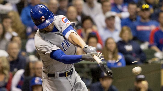 Kris Bryant #17 of the Chicago Cubs breaks his bat while hitting a single in the sixth inning against the Milwaukee Brewers at Miller Park