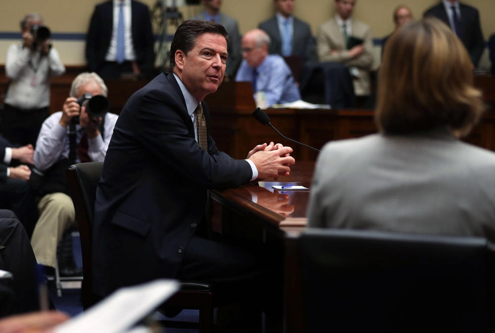 FBI Director James Comey testifies during a hearing before House Oversight and Government Reform Committee on Thursday