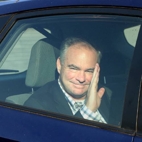 Tim Kaine a leading contender to be Democratic presidential candidate Hillary Clinton's pick for vice president waves to the crowd before attending a private fundraiser event in Newport RI hosted by fellow Democratic Senat