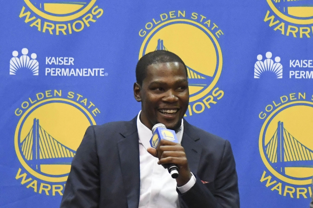 Jul 7 2016 Oakland CA USA Kevin Durant addresses the media in a press conference after signing with the Golden State Warriors at the Warriors Practice Facility. Mandatory Credit Kyle Terada-USA TODAY Sports ORG XMIT USATSI-306800 ORIG FILE ID 201