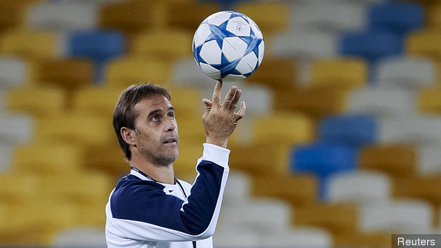 Porto's coach Lopetegui controls a ball during a training session at the Olympic stadium in Kiev