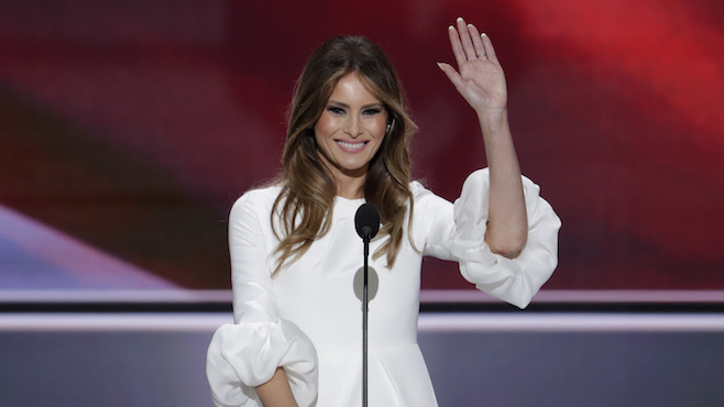 Melania Trump wife of Republican Presidential Candidate Donald Trump waves as she speaks during the opening day of the Republican National Convention in Cleveland Monday