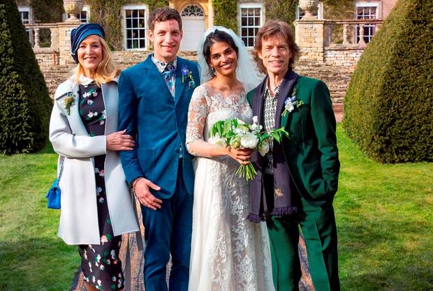 Mick Jagger with his son James Jagger at his wedding to Anoushka Sharma with his ex-partner Jerry Hall