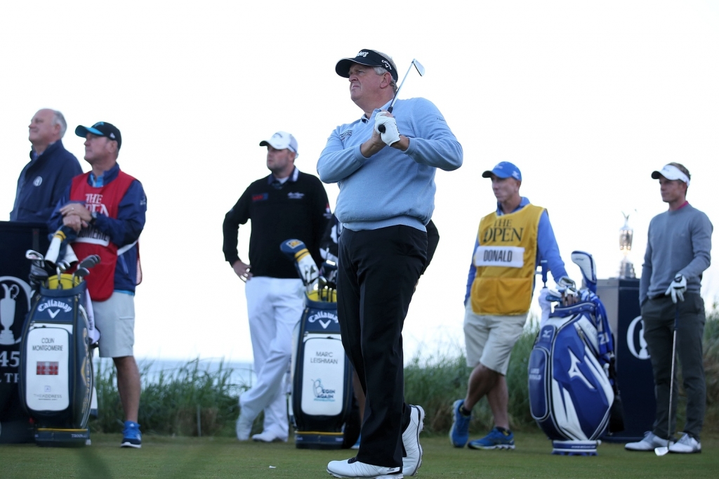 Montgomerie tees off on the first hole to begin his final Open on his home course Times