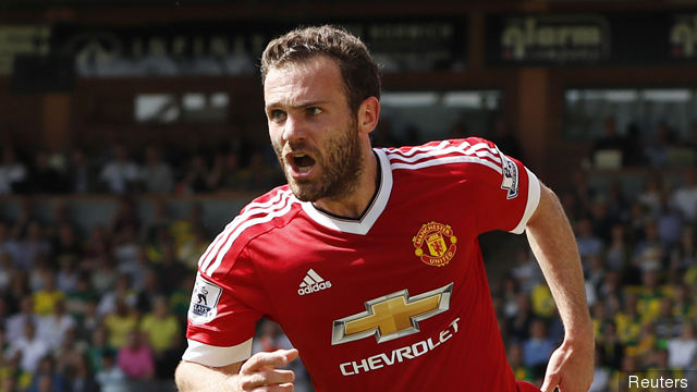 Juan Mata celebrates scoring the first goal for Manchester United