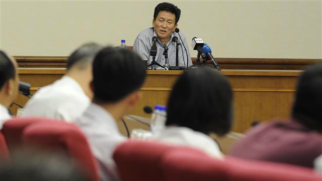 Ko Hyon-chol attends press conference after being detained on charges of child abduction in the People’s Palace of Culture in Pyongyang North Korea