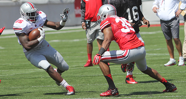 Then-redshirt-sophomore running back Bri'onte Dunn carries the ball during the 2014 OSU Spring Game on at Ohio Stadium. Credit Lantern file