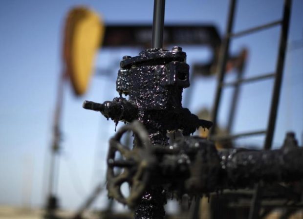 File of pump jacks are seen in the Midway Sunset oilfield