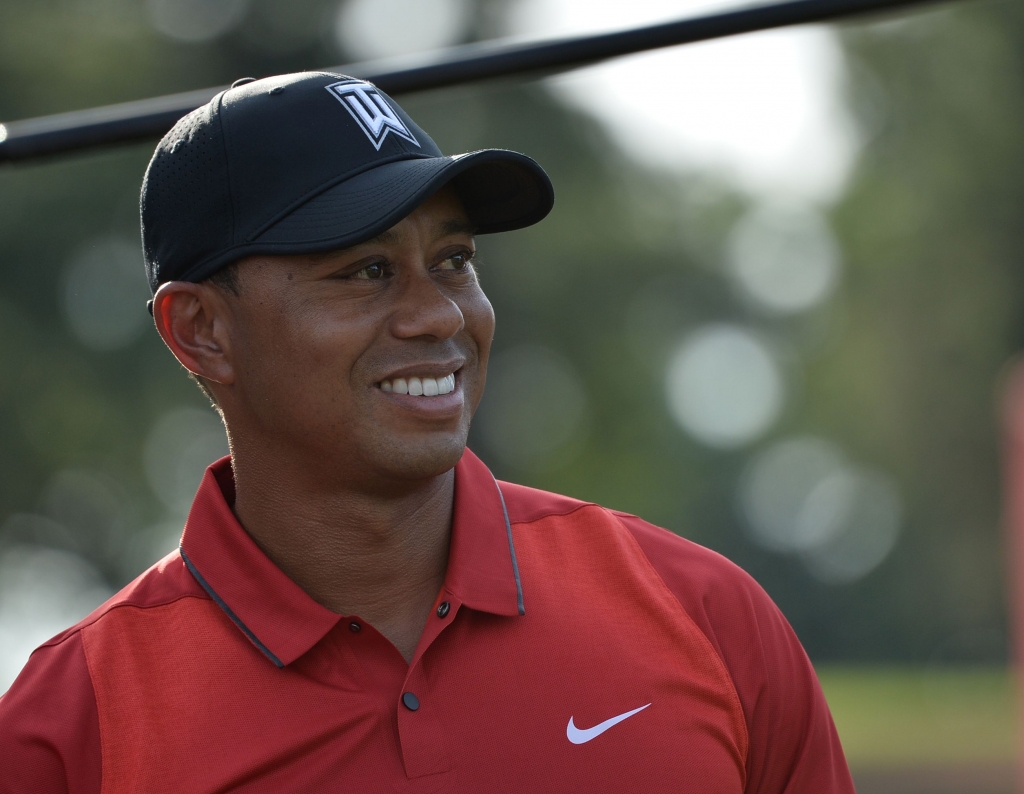 26 2016 shows Tiger Woods as he looks on after the Quicken Loans National at Congressional Country Club in Bethesda Maryland. Ailing Tiger Woods pulled out of the PGA Championship