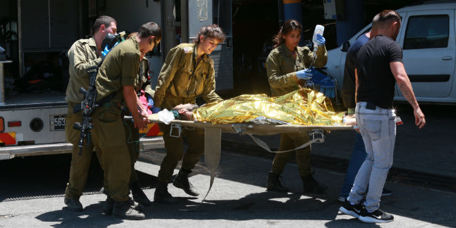 The attacker who stabbed IDF soldiers with a screwdriver is transported to medical treatment after being neutralized by IDF forces