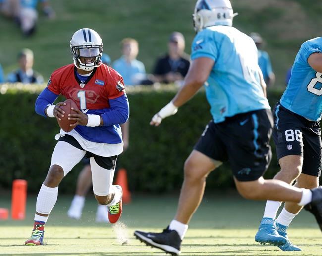 Carolina Panthers quarterback Cam Newton runs a drill during the NFL football team's training camp in Spartanburg S.C. Thursday