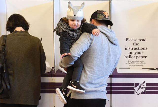 People vote at a voting station in the Sydney suburb of Bondi Beach