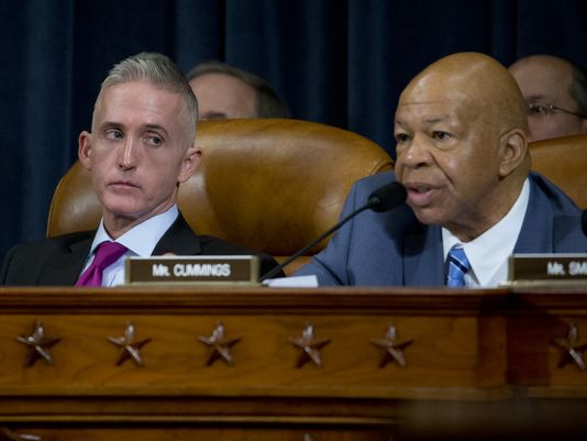 House Benghazi Committee Chairman Trey Gowdy R-S.C. left watches as the committee's ranking member Rep. Elijah Cummings D-Md. questions Hillary Clinton