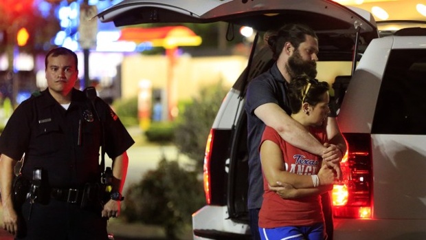 Dallas officer next to couple