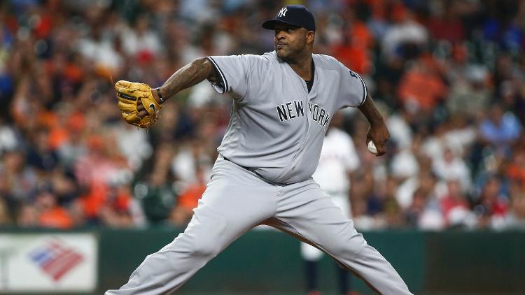 New York Yankees starting pitcher CC Sabathia delivers a pitch during the sixth inning against the Houston Astros at Minute Maid Park