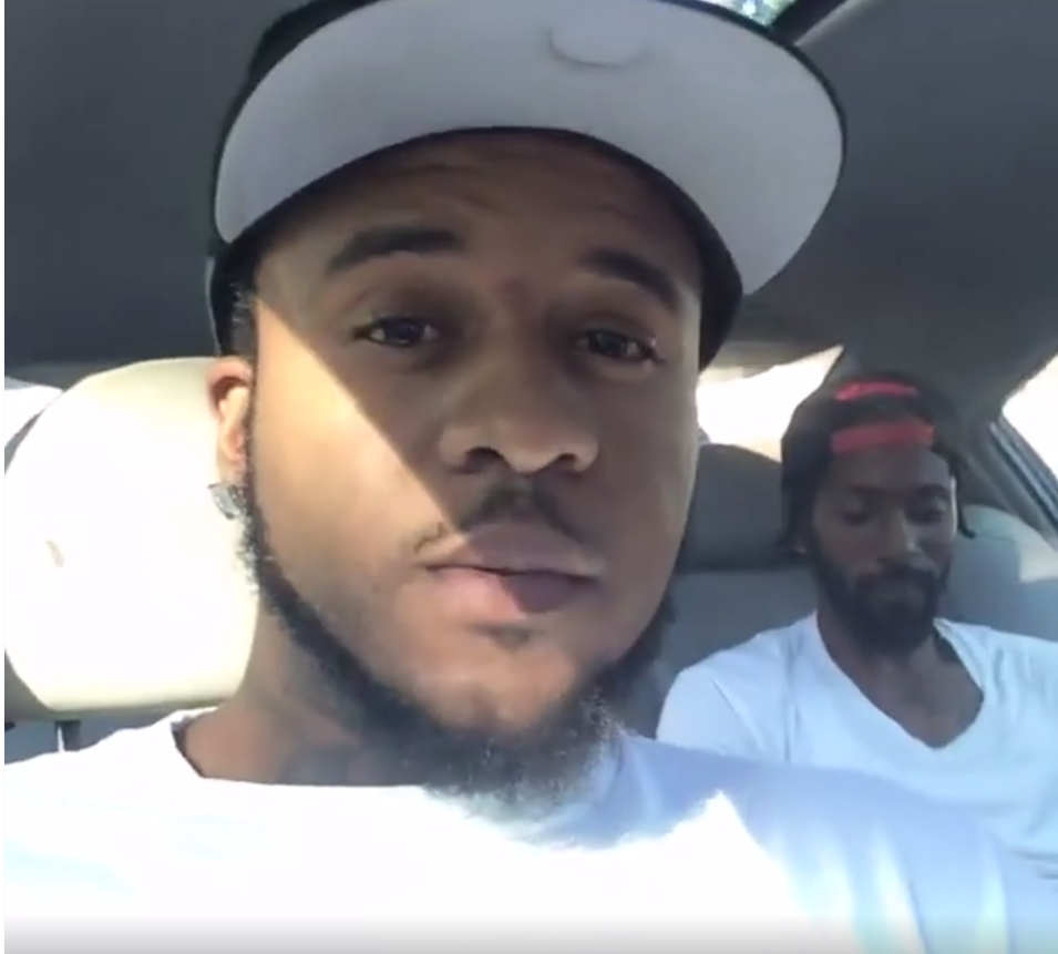 Screenshot from FB Live footage showing two of the men who were in the vehicle before gunshots were fired