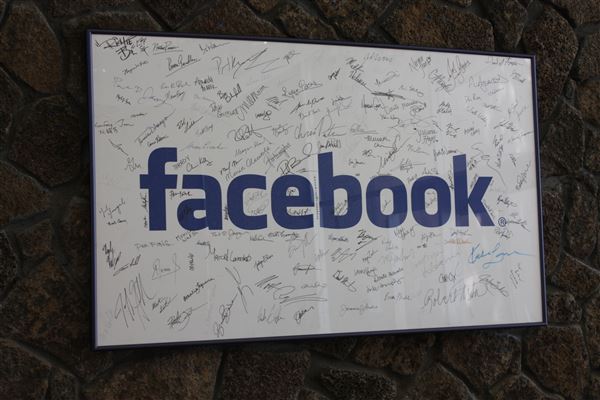 Sign in Facebook headquarters with signatures of the comapny's original employees.      CNN   
   Enlarge