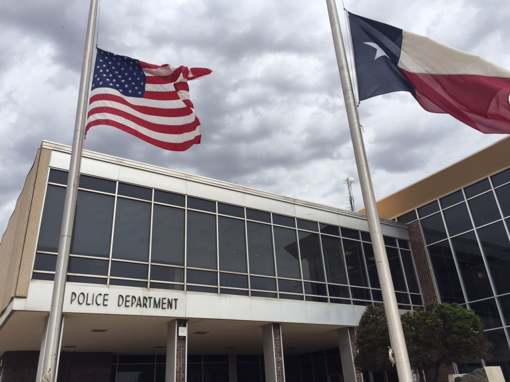 Flags lowered to honor slain officers