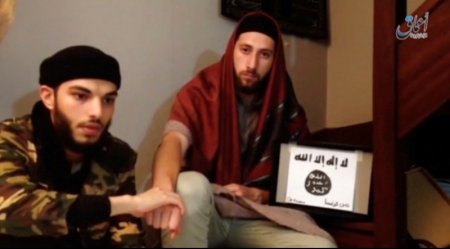 This still image taken from video shows the two men Abdel Malik Nabil Petitjean and Adel Kermiche behind the church attack in Normandy in this video released