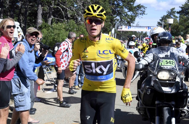 Froome retains Tour de France lead despite mountain chaos